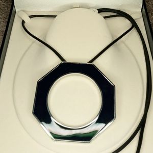 One size, black and silver with leather lace necklace